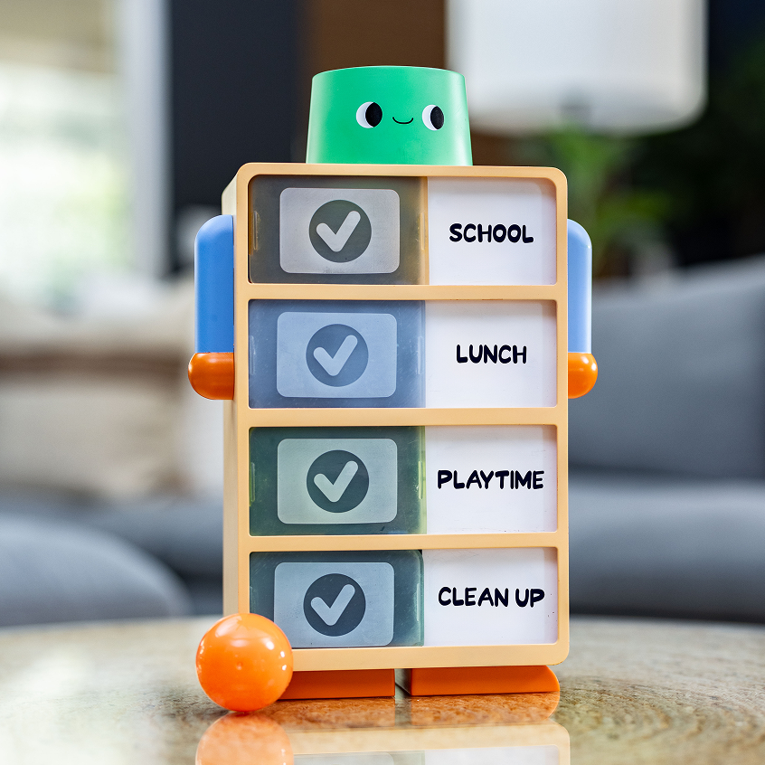 Routine Robot toy from Mental Reps Co. with School, Lunch, Playtime, and Clean Up task tiles